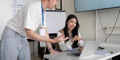 Engaged professionals reviewing financial data and strategies in a collaborative workspace photo