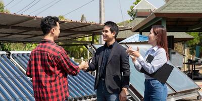 Handshake in sustainable energy. Professionals finalize discussions on solar panel projects, emphasizing teamwork and collaboration. photo