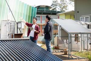 Solar technology discussion. Professionals engage in conversation about sustainable energy solutions and solar panel systems. photo