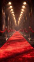 Luxurious red carpet setting in an opulent hall with golden lighting and elegant ropes photo