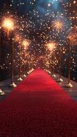 Red carpet entrance illuminated by fireworks at a festive evening event photo
