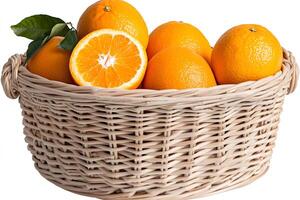 Fresh oranges with leaves resting in wicker basket on white background photo