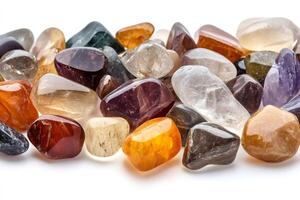Colorful tumbled gemstones creating a vibrant and captivating display photo