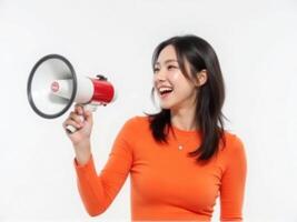 A woman is holding a megaphone and smiling photo