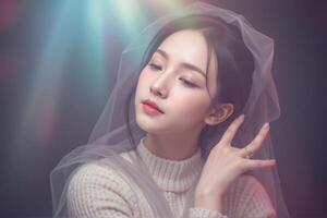 A woman in a white sweater and veil photo