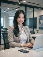 businesswoman confidently as she types on her laptop, sitting at a stylish desk in a modern office with vibrant decor and large windows photo