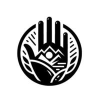 A stylized black and white depicting a hand cradling mountains and a sun within a circular frame, symbolizing nature. vector