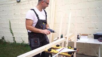 Crafting custom wooden structures in the backyard workshop on a sunny afternoon video