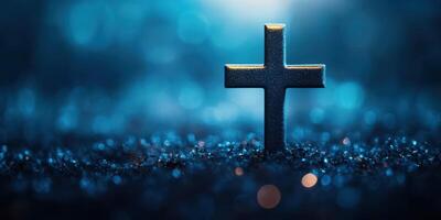 Beautiful cross stands illuminated in dark surroundings with shimmering light reflections, symbolizing hope and faith photo