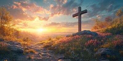 Scenic sunset view with a cross standing on a hill surrounded by flowers photo