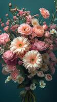 Vibrant bouquet of pink and white flowers arranged artistically against a teal background photo