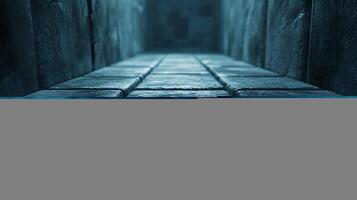 A dark blue image of a stone walkway with a few tiles visible photo