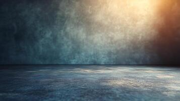 A textured blue surface illuminated by a warm glow A clean and versatile backdrop for product showcases or creative designs photo