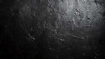 Abstract textured black surface with visible brush strokes creating a dark and dramatic visual for artistic or design applications photo