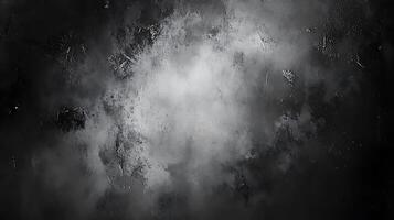 Abstract dark texture with silvery accents The surface is rough creating depth and a sense of mystery The light catches the edges photo