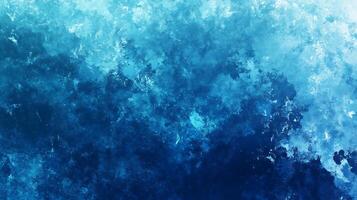 Abstract artwork with mixed blues suggesting a dynamic ocean scene or a vibrant textured painting with depth and visual interest photo