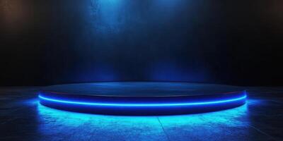 Circular stage with blue lighting in dark atmosphere for performances or events photo