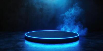 Modern circular stage with blue neon lights and fog in a dark atmosphere set for a performance or event photo