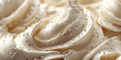 Creamy swirls of gourmet frosting topped with delicate air bubbles create an enticing dessert topping experience photo
