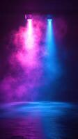 Colorful stage lighting creates a vibrant atmosphere with purple and blue fog for a performance or event photo