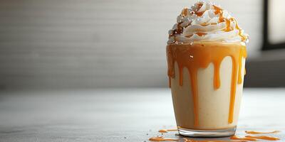 Delicious creamy dessert drink topped with whipped cream and caramel syrup in cozy indoor setting photo