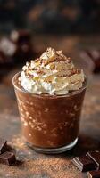 Delicious chocolate dessert topped with whipped cream and chocolate shavings in a cozy setting photo