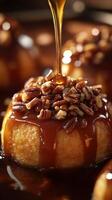 Delicious dessert being drizzled with caramel and topped with crunchy pecans in a cozy kitchen setting photo