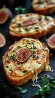 Delicious fig and cheese toast topped with herbs and ham served on a dark plate photo