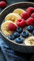 Delicious and nutritious chia seed pudding topped with fresh berries and banana slices in a cozy kitchen setting photo