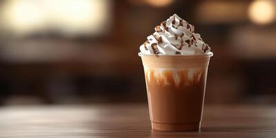Creamy chocolate beverage with whipped topping captured in a cozy coffee shop setting photo