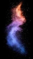 Colorful cosmic cloud formation with vibrant hues of blue, purple, and orange in a star-filled space background photo