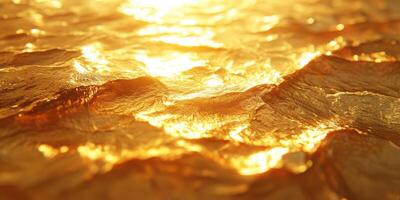 Rippling golden waves reflect sunlight in tranquil water at sunset photo