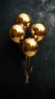 Gold balloons tied together gently float against a dark textured background in a festive display, ideal for celebrations or special occasions photo