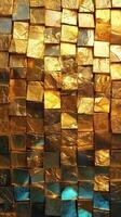 Glimmering mosaic of gold and blue metallic squares arranged in a stunning pattern photo