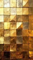 Golden and silver textured squares create an elegant wall design suitable for luxury interiors and events photo