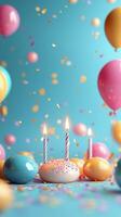 Festive celebration with colorful balloons and a decorated cake on a blue background photo