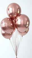 Festive rose gold balloons with glitter for celebration decoration in a bright space photo
