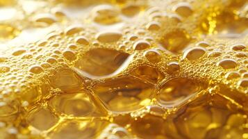 Liquid gold surface tension featuring intricate cellular structure and shimmering reflections photo