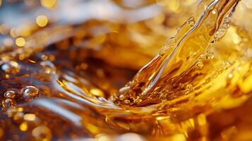 Golden liquid movement with fluid dynamics featuring dynamic stream and subtle light effects photo