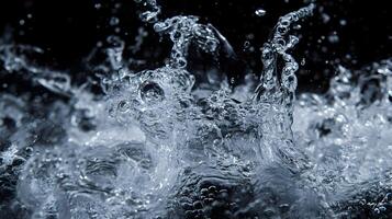 Dynamic burst of water captured in a high speed photography against a stark background photo