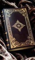 Elegant book with gold decorative detailing resting on a luxurious fur texture surface photo