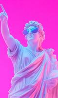 Sculpture illuminated in neon lighting points upward, blending classic art with modernity photo