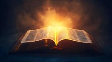 An open book with light glowing illuminating the pages, creating spiritual significance photo
