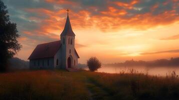 Tranquil church at sunset amidst a field, radiating faith and serenity during twilight photo