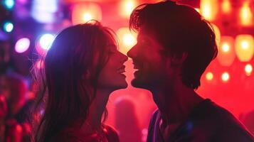This Laughs and smiles fill the air as a couple enjoys a joyful moment in a vibrant party atmosphere. photo