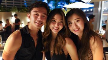 This Group of friends smiles while celebrating during a lively nightlife event in a trendy location. photo