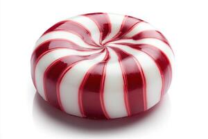 Classic red and white peppermint candy with spiral design photo