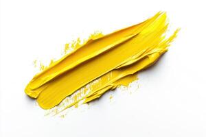 Vibrant yellow paint swatch on a white canvas for creative projects photo
