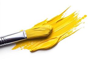 Bright yellow paint spread across a clean white surface photo