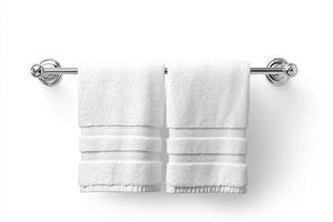 White towels neatly hanging on a silver towel rack in a bathroom photo